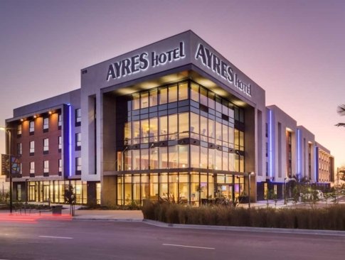 exterior of the hotel at dusk