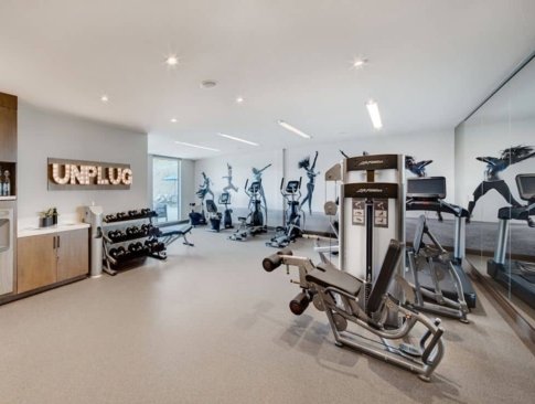 photo of the exercise room with treadmills and 